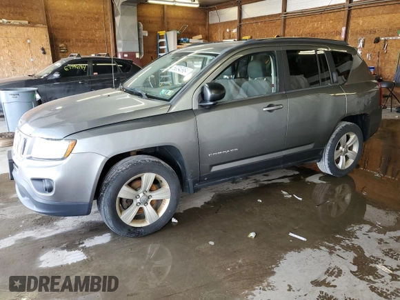 2014 Jeep Compass Sport with VIN 1C4NJDBB6ED592223, listed as a Copart auction lot 63343984 with 124,942 mi miles and Clean Title. Bid and sale history available at carsss.com. Image 1.