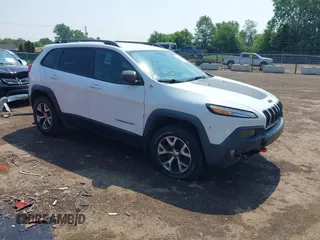 2014 Jeep Cherokee Trailhawk with VIN 1C4PJMBS0EW188976, listed as a IAAI auction lot 42587233 with 191,670 mi miles and . Bid and sale history available at DreamBid. Image 1.