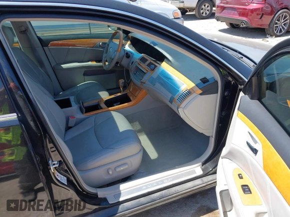 2007 Toyota Avalon XL z VIN 4T1BK36B17U213437, wystawiony jako IAAI lot #42040122 z przebiegiem 130 645 mil mil oraz . Historia ofert i sprzedaży dostępna na DreamBid. Obrazek 5.