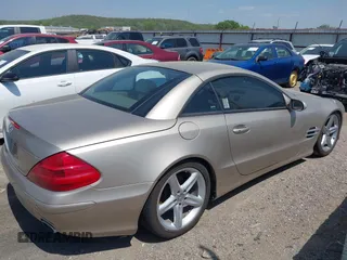 2004 Mercedes-Benz SL 500 z VIN WDBSK75F34F071610, wystawiony jako IAAI lot #42042918 z przebiegiem Nie podano mil oraz . Historia ofert i sprzedaży dostępna na DreamBid. Obrazek 13.