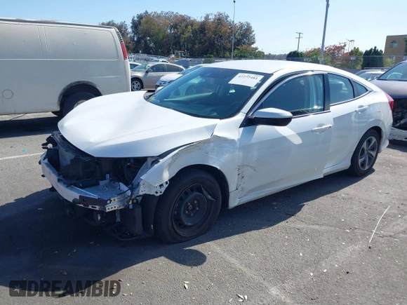 2020 Honda Civic LX z VIN 19XFC2F67LE212561, wystawiony jako IAAI lot #42272481 z przebiegiem 50 681 mil mil oraz . Historia ofert i sprzedaży dostępna na DreamBid. Obrazek 20.