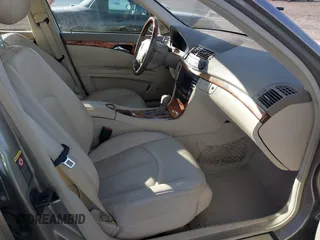 2005 Mercedes-Benz E-Class 3.2L with VIN WDBUF65J05A646577, listed as a IAAI auction lot 41666861 with 106,012 mi miles. Bid and sale history available at carsss.com. Image 5.