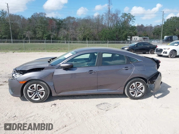 2017 Honda Civic LX with VIN 19XFC2F51HE036153, listed as a IAAI auction lot 41546498 with 78,726 mi miles and . Bid and sale history available at DreamBid. Image 14.