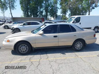 1996 Toyota Camry DX z VIN JT2BG12K0T0347950, wystawiony jako IAAI lot #42248890 z przebiegiem 264 017 mil mil oraz . Historia ofert i sprzedaży dostępna na DreamBid. Obrazek 14.