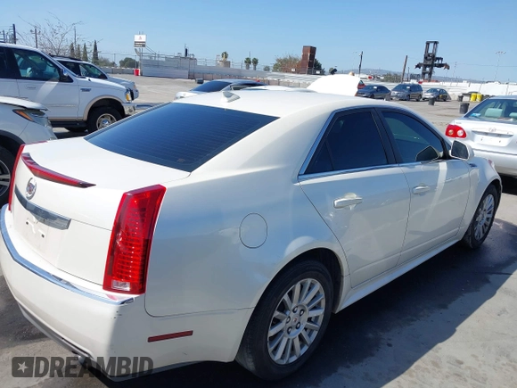 2010 Cadillac CTS with VIN 1G6DA5EG7A0135451, listed as a IAAI auction lot 41964313 with 136,172 mi miles and . Bid and sale history available at DreamBid. Image 4.