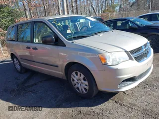 2014 Dodge Grand Caravan SE with VIN 2C4RDGBG3ER452732, listed as a IAAI auction lot 41213062 with 105,379 mi miles and . Bid and sale history available at DreamBid. Image 1.
