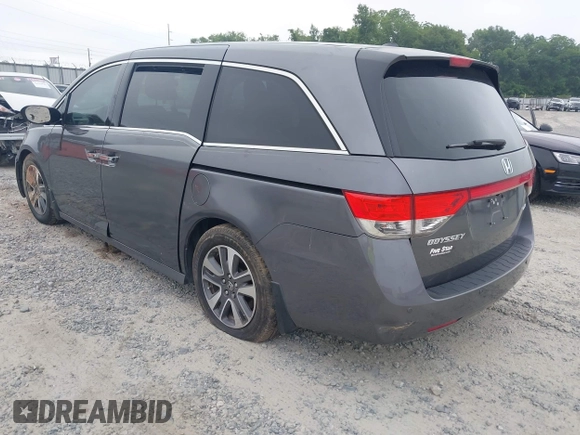 2014 Honda Odyssey Touring with VIN 5FNRL5H98EB008953, listed as a IAAI auction lot 42291179 with Not provided miles and . Bid and sale history available at DreamBid. Image 3.