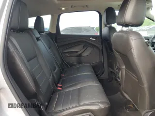 2015 Ford Escape Titanium с VIN 1FMCU9J99FUC33052, выставлен на аукционе Copart как лот 56508365 с пробегом Не указан миль и На запчасти • Non repairable. История ставок и продаж доступна на DreamBid. Изображение 11.
