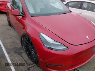 2022 Tesla Model Y Performance z VIN 7SAYGDEF6NF511436, wystawiony jako IAAI lot #42078122 z przebiegiem 44 006 mil mil oraz . Historia ofert i sprzedaży dostępna na DreamBid. Obrazek 6.
