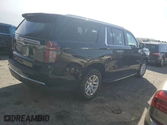 2023 Chevrolet Suburban LS with VIN 1GNSCBKD8PR163178, listed as a Copart auction lot 47844175 with 104,369 mi miles and Salvage Title. Bid and sale history available at DreamBid. Image 3.