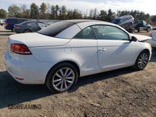 2015 Volkswagen Eos Komfort with VIN WVWBW8AH1FV000692, listed as a Copart auction lot 77866694 with 114,156 mi miles and Salvage Title. Bid and sale history available at DreamBid. Image 3.