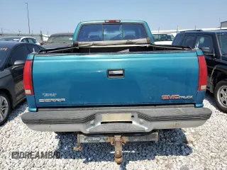 1997 GMC Sierra 2500 z VIN 1GTGK29JXVE562949, wystawiony jako Copart lot #68270174 z przebiegiem 212 422 mil mil oraz Szkody całkowita. Historia ofert i sprzedaży dostępna na DreamBid. Obrazek 6.