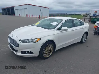 2015 Ford Fusion SE z VIN 3FA6P0H9XFR294210, wystawiony jako IAAI lot #42187211 z przebiegiem 171 326 mil mil oraz . Historia ofert i sprzedaży dostępna na DreamBid. Obrazek 2.