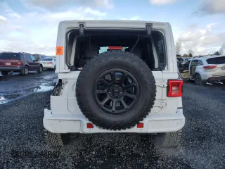 2020 Jeep Wrangler Unlimited Sahara Altitude z VIN 1C4HJXEG2LW319304, wystawiony jako Copart lot #88274015 z przebiegiem 50 599 mil mil oraz Szkoda całkowita • Salvage title. Historia ofert i sprzedaży dostępna na DreamBid. Obrazek 6.