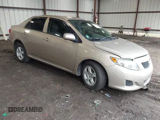 2009 Toyota Corolla z VIN 2T1BU40E69C158930, wystawiony jako IAAI lot #41964354 z przebiegiem 128 606 mil mil oraz . Historia ofert i sprzedaży dostępna na DreamBid. Obrazek 1.