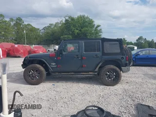 2007 Jeep Wrangler Unlimited Sahara with VIN 1J4GB59167L221686, listed as a IAAI auction lot 42473996 with 151,065 mi miles and . Bid and sale history available at DreamBid. Image 14.