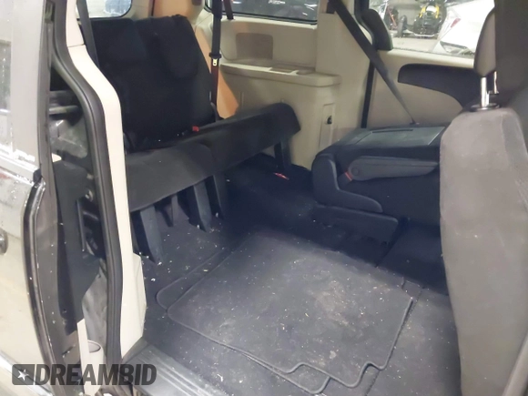 2012 Dodge Grand Caravan SE with VIN 2C4RDGBG8CR155758, listed as a IAAI auction lot 41300951 with 126,209 mi miles and . Bid and sale history available at DreamBid. Image 8.