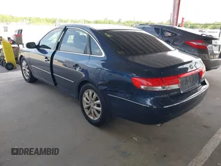 2007 Hyundai Azera SE z VIN KMHFC46FX7A147219, wystawiony jako IAAI lot #42346432 z przebiegiem 163 646 mil mil oraz . Historia ofert i sprzedaży dostępna na DreamBid. Obrazek 3.