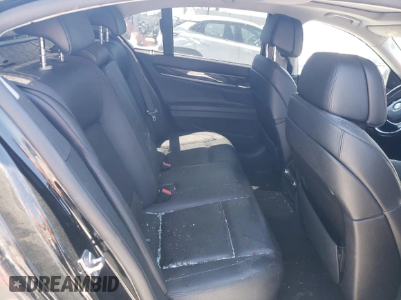 2012 BMW 7 Series 740i with VIN WBAKA4C59CDS99342, listed as a Copart auction lot 63705894 with 0 mi miles and Salvage Title. Bid and sale history available at carsss.com. Image 10.