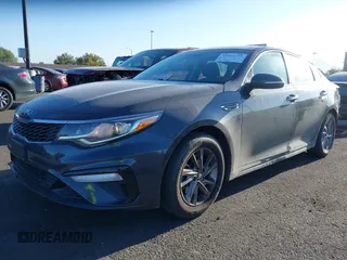 2019 Kia Optima LX with VIN 5XXGT4L36KG292905, listed as a IAAI auction lot 42011723 with 113,553 mi miles. Bid and sale history available at carsss.com. Image 2.