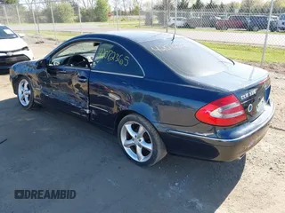 2004 Mercedes-Benz CLK 3.2L with VIN WDBTJ65J44F084713, listed as a IAAI auction lot 42072365 with 127,824 mi miles. Bid and sale history available at carsss.com. Image 3.