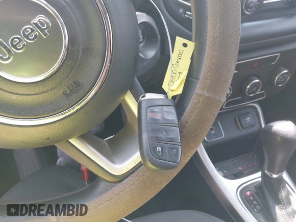 2018 Jeep Compass Sport with VIN 3C4NJCABXJT502717, listed as a IAAI auction lot 41985204 with 124,900 mi miles and . Bid and sale history available at DreamBid. Image 11.