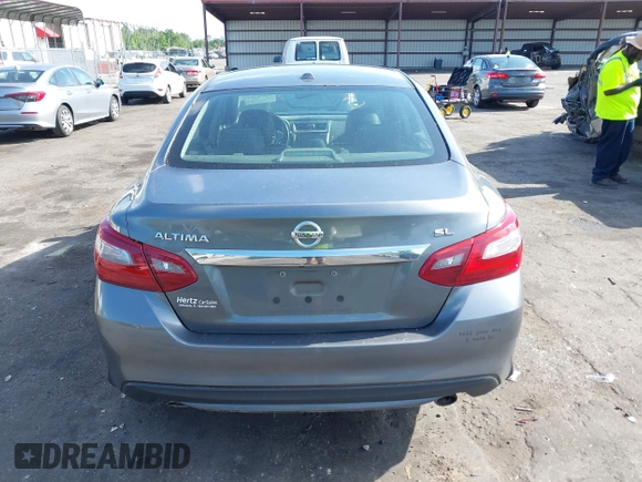 2018 Nissan Altima 2.5 SR with VIN 1N4AL3AP3JC127999, listed as a IAAI auction lot 42016201 with 120,628 mi miles. Bid and sale history available at carsss.com. Image 16.