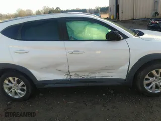 2019 Hyundai Tucson Value with VIN KM8J3CA4XKU894613, listed as a IAAI auction lot 41527548 with 139,734 mi miles. Bid and sale history available at carsss.com. Image 14.