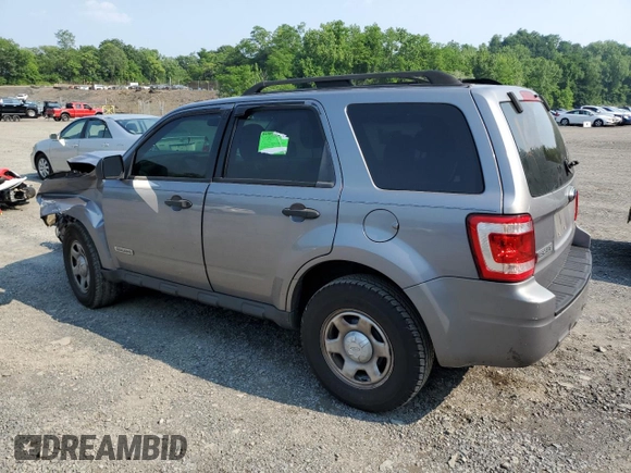2008 Ford Escape XLS with VIN 1FMCU02Z18KE11979, listed as a Copart auction lot 60212165 with 239,177 mi miles and Salvage title. Bid and sale history available at DreamBid. Image 2.