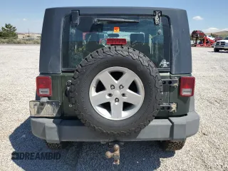 2008 Jeep Wrangler Rubicon z VIN 1J4GA64108L616531, wystawiony jako Copart lot #58363534 z przebiegiem Nie podano mil oraz Szkoda całkowita • Salvage title. Historia ofert i sprzedaży dostępna na DreamBid. Obrazek 6.