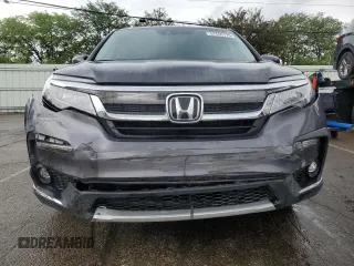 2020 Honda Pilot Touring 7-Passenger z VIN 5FNYF6H68LB052379, wystawiony jako Copart lot #57655775 z przebiegiem 73 501 mil mil oraz Szkoda całkowita • Salvage title. Historia ofert i sprzedaży dostępna na DreamBid. Obrazek 5.