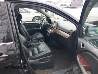 2008 Honda Odyssey Touring with VIN 5FNRL38948B029193, listed as a IAAI auction lot 41618424 with 219,964 mi miles. Bid and sale history available at carsss.com. Image 5.