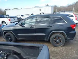 2011 Jeep Grand Cherokee Laredo with VIN 1J4RR4GG5BC670369, listed as a IAAI auction lot 41892892 with 164,807 mi miles and . Bid and sale history available at DreamBid. Image 14.
