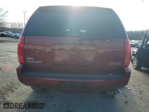 2009 GMC Yukon SLT w/4SA with VIN 1GKFK330X9R207168, listed as a Copart auction lot 85997244 with 123,227 mi miles and Salvage Title. Bid and sale history available at carsss.com. Image 6.