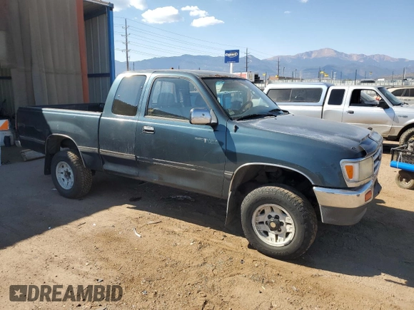 1995 Toyota T100 z VIN JT4VD22F4S0006698, wystawiony jako Copart lot #76022924 z przebiegiem 457 624 mil mil oraz Czysty tytuł • Clean title. Historia ofert i sprzedaży dostępna na DreamBid. Obrazek 4.