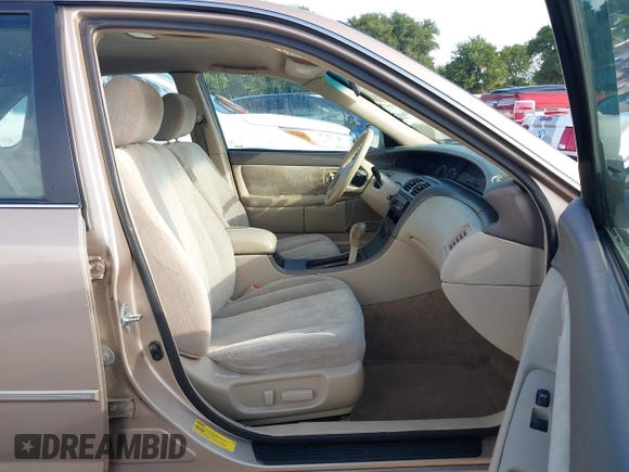 2001 Toyota Avalon XL z VIN 4T1BF28B31U185174, wystawiony jako IAAI lot #42338204 z przebiegiem 298 540 mil mil oraz . Historia ofert i sprzedaży dostępna na DreamBid. Obrazek 5.