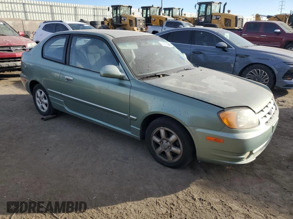 2003 Hyundai Accent GL with VIN KMHCG35CX3U242848, listed as a Copart auction lot 86558394 with 56,248 mi miles and Salvage Title. Bid and sale history available at carsss.com. Image 4.