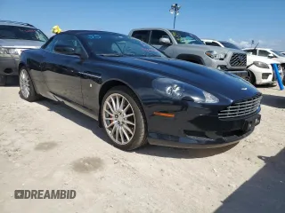 2009 Aston Martin DB9 z VIN SCFAD02E79GB10991, wystawiony jako Copart lot #75089204 z przebiegiem Nie podano mil oraz Szkody całkowita. Historia ofert i sprzedaży dostępna na DreamBid. Obrazek 4.
