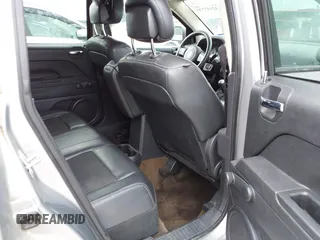 2014 Jeep Compass Sport with VIN 1C4NJCBA3ED769764, listed as a IAAI auction lot 42147739 with 141,979 mi miles. Bid and sale history available at carsss.com. Image 8.