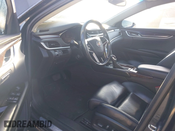 2013 Cadillac XTS Luxury with VIN 2G61P5S3XD9141306, listed as a IAAI auction lot 42034077 with 120,294 mi miles. Bid and sale history available at carsss.com. Image 5.