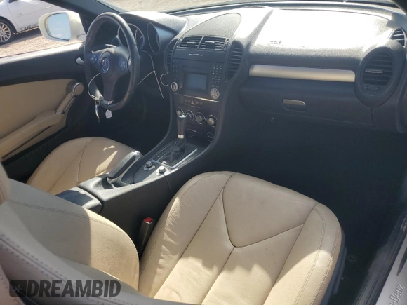 2009 Mercedes-Benz SLK-Class 3.0L with VIN WDBWK54F79F209339, listed as a Copart auction lot 77400294 with 68,540 mi miles and Salvage Title. Bid and sale history available at carsss.com. Image 8.