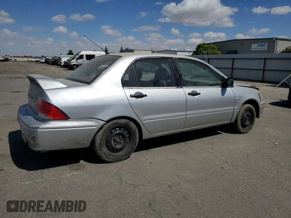 2003 Mitsubishi Lancer ES with VIN JA3AJ26E73U062975, listed as a Copart auction lot 71619374 with 242,550 mi miles and Salvage Title. Bid and sale history available at carsss.com. Image 3.
