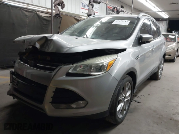 2015 Ford Escape Titanium with VIN 1FMCU0J96FUB81598, listed as a IAAI auction lot 41872114 with 122,001 mi miles and . Bid and sale history available at DreamBid. Image 17.