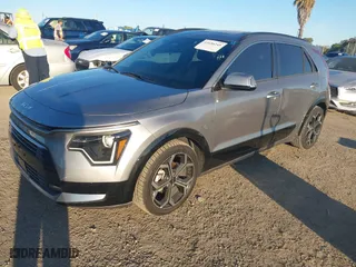2023 Kia Niro EX Touring with VIN KNDCR3LE3P5093377, listed as a IAAI auction lot 41656245 with 96,469 mi miles. Bid and sale history available at carsss.com. Image 2.