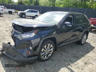 2021 Toyota RAV4 XLE Premium with VIN 2T3A1RFV3MC195877, listed as a Copart auction lot 55220955 with 92,679 mi miles and Salvage title. Bid and sale history available at DreamBid. Image 1.