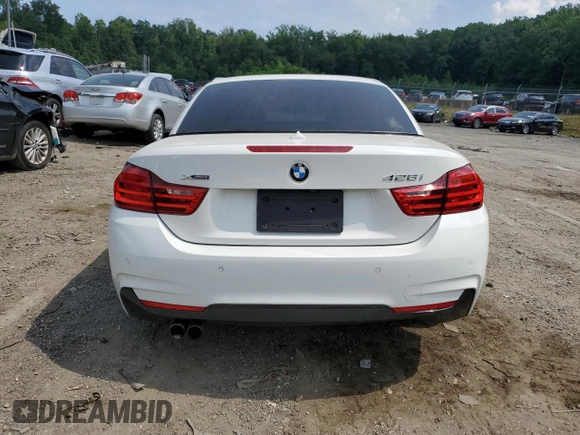2014 BMW 4 Series 428i xDrive z VIN WBA3T1C56EPS98910, wystawiony jako Copart lot #65903985 z przebiegiem 95 328 mil mil oraz Szkoda całkowita • Salvage title. Historia ofert i sprzedaży dostępna na DreamBid. Obrazek 6.