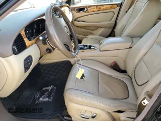 2008 Jaguar XJ with VIN SAJWA79BX8SH23430, listed as a Copart auction lot 51990785 with 140,454 mi miles and Salvage Title. Bid and sale history available at carsss.com. Image 7.
