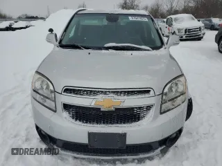 2014 Chevrolet Orlando z VIN KL77P2EK4EK507427, wystawiony jako Copart lot #87641825 z przebiegiem 138 625 mil mil oraz Tytuł czysty. Historia ofert i sprzedaży dostępna na DreamBid. Obrazek 5.