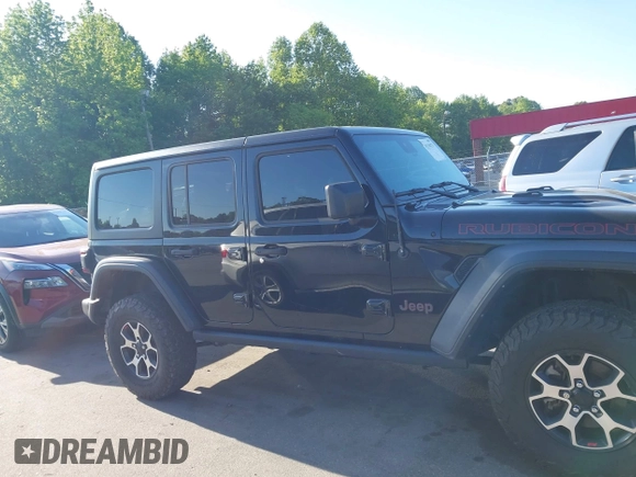2022 Jeep Wrangler Unlimited Rubicon with VIN 1C4HJXFNXNW149063, listed as a IAAI auction lot 42130171 with 33,961 mi miles and . Bid and sale history available at DreamBid. Image 13.