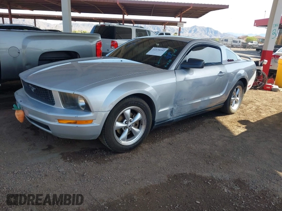 2007 Ford Mustang Deluxe with VIN 1ZVFT80N475199141, listed as a IAAI auction lot 41979242 with 243,967 mi miles and . Bid and sale history available at carsss.com. Image 2.